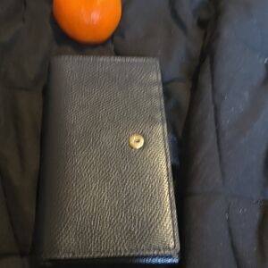Coach Black and Tan Textured Wallet